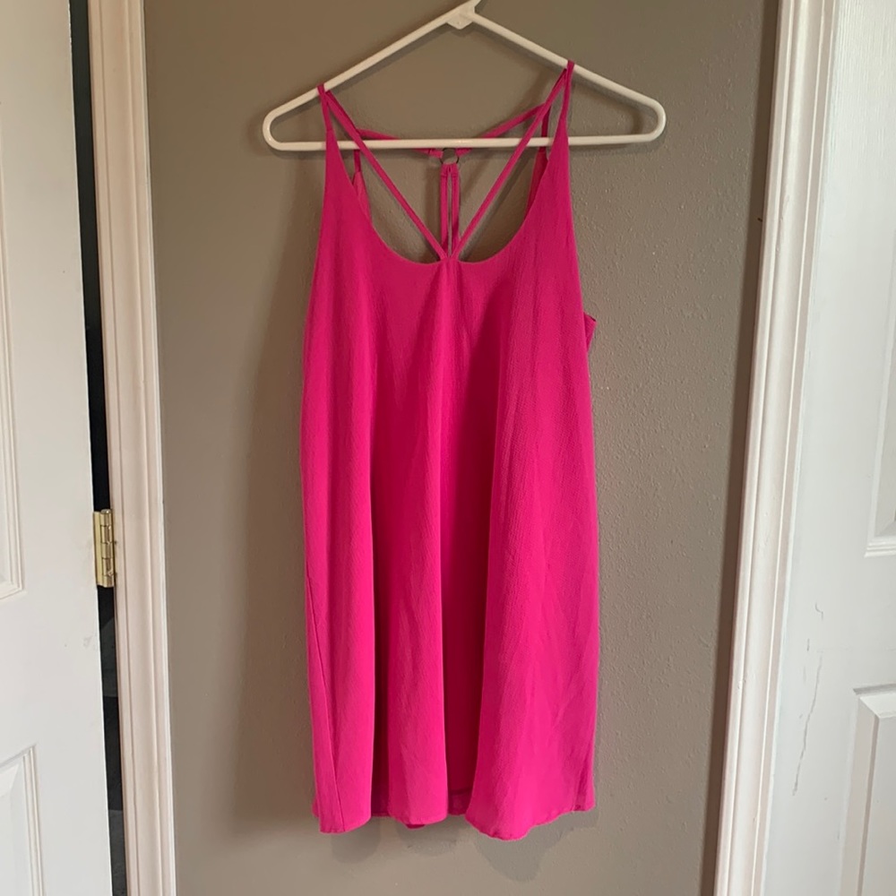 Bright pink cocktail dress. Like new. Womens size small. No signs of wear